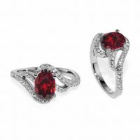 Oval Garnet and White Cubic Zirconia Ring in Silver