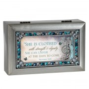 SHE IS CLOTHED WITH