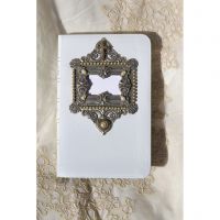 White KJV Compact Bible with a Silver metal frame with faux Pearls